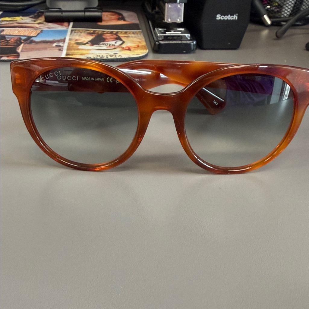 Gucci Amber Sunglasses With Dark Lenses